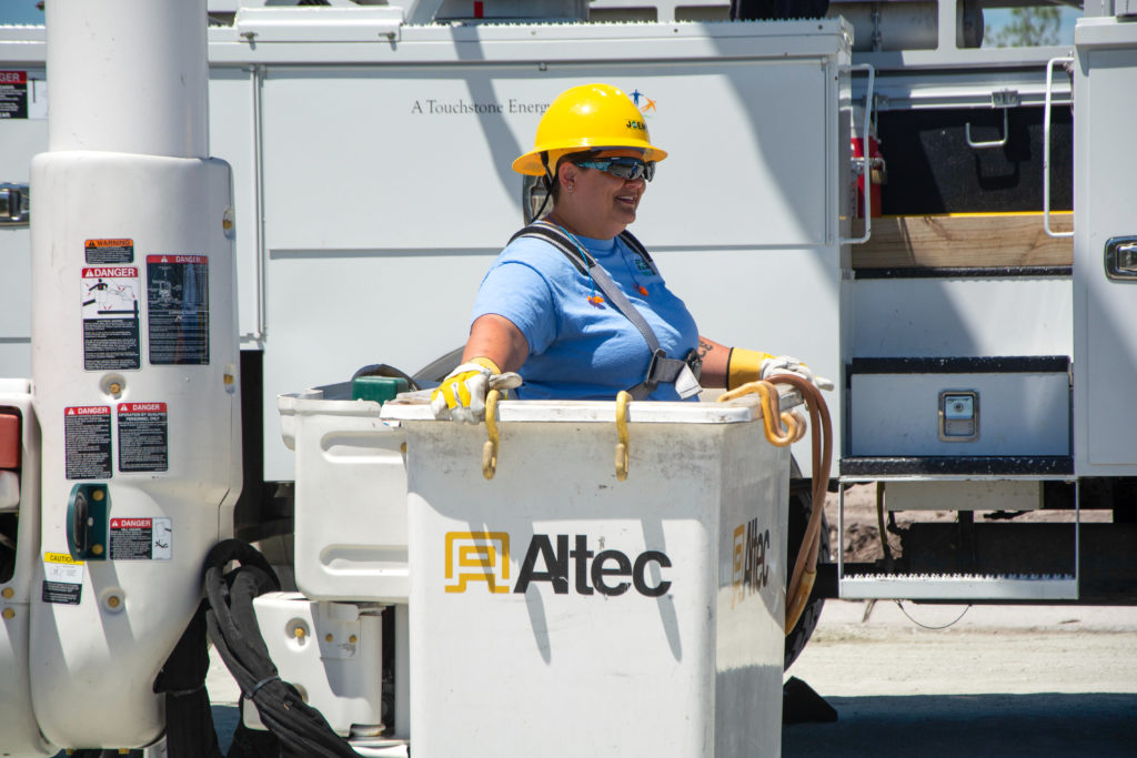 woman in bucket truck